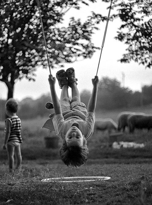 child swinging