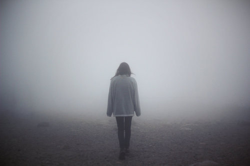 walking away in mist